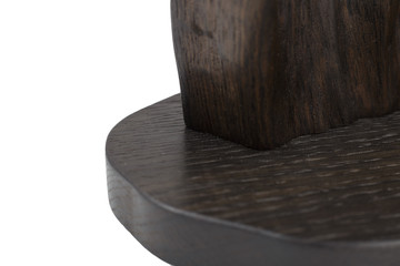 Carved sculpture of bog oak on a white background.