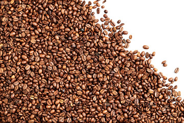 Layer of isolated Roasted Coffee beans, white negative space in the top right corner