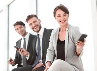 successful business team sitting in the office lobby