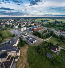 Fototapeta premium Aerial view of the city at sunset. Beautiful summer city landscape. 