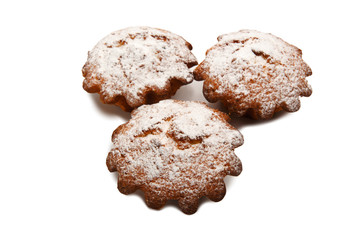 Group of muffins sprinkled with powdered sugar