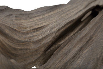 Carved sculpture of bog oak on a white background.
