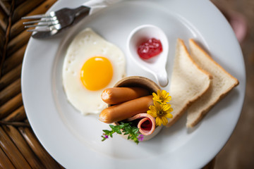 The set of breakfast on the white plate