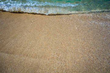 beautiful sandy beach and soft blue ocean wave