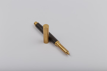 Exotic, Luxury Iroko wood bolt-action pen with chrome metal fixtures and beautiful knot in the wood - Product Photo Ballpoint Pen Handmade Hand Crafted.