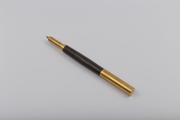 Exotic, Luxury Iroko wood bolt-action pen with chrome metal fixtures and beautiful knot in the wood - Product Photo Ballpoint Pen Handmade Hand Crafted.