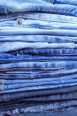 Jeans trousers stack closeup background texture - Image