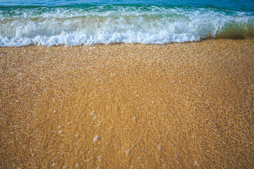 beautiful sandy beach and soft blue ocean wave