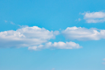 white clouds in the blue sky
