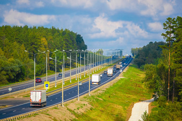 Tula region, Russia - September, 8, 2019: trucks on a highway in Tula region, Russia