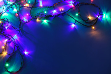 Beautiful Christmas lights on dark background