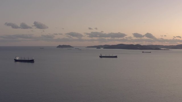 General cargo ships at the anchorage in the evening, Far East, Russia