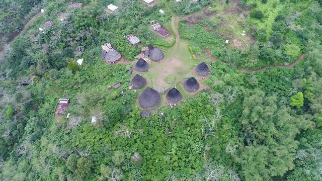 Traditional village Wae Rebo on Flores island in Indonesia. aerial view drone 4k.