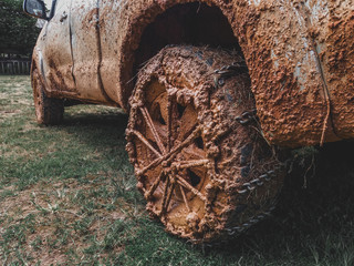 wheels tires and off road truck shaft that goes in the and mud through the wheels in the forest