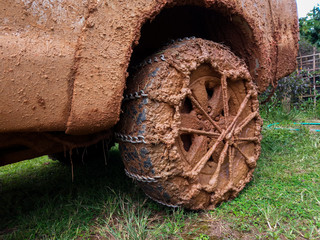 wheels tires and off road truck shaft that goes in the and mud through the wheels in the forest