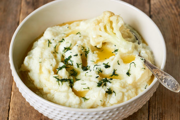 Cauliflower puree with butter and fresh herbs  