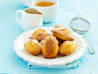 Madeleine french cookies with caramel. selective focus.