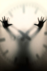 A man in the clock, time passing.