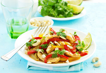 Chicken with vegetables in sweet and sour sauce.