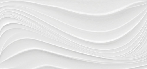 The texture of white marble for a pattern of packaging in a modern style. Beautiful drawing with the divorces and wavy lines in gray tones for wallpapers and screensaver.