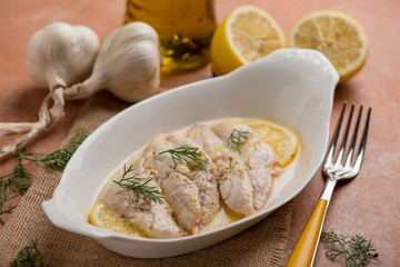red mullet fillet with lemon sauce and garlic