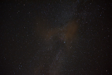 Milky Way over the head. Night starry sky over the mountains. Stars and constellations in the sky.