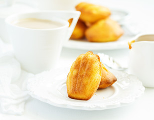 Madeleine french cookies with caramel. selective focus.