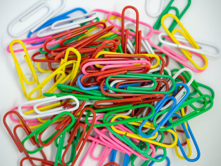 Colorful PaperClip,Cluster isolated on white background,Texture,Close up,Material Office,Business,Rad,Yellow,White,Green,Blue