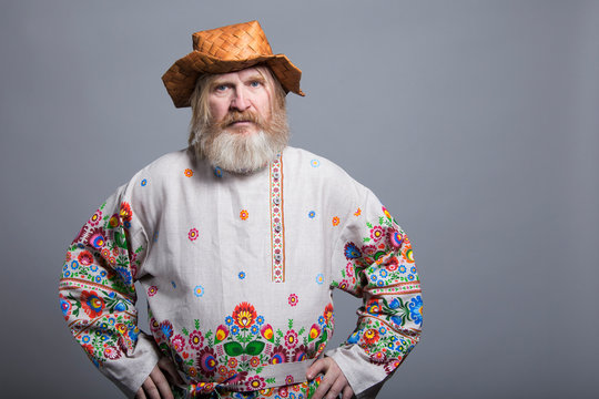 Slavic bearded painted shirt and birchbark hat