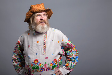 Slavic bearded painted shirt and birchbark hat