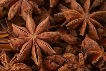Star anise isolated on wooden background.