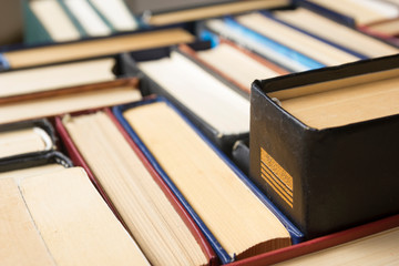 Stack of books background. many books piles.