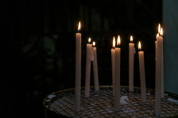 Long wax candle used in religious worship