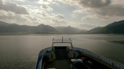 View from bow of cruise ship. Sailboat sailing in Mediterranean sea. Greece. 4K