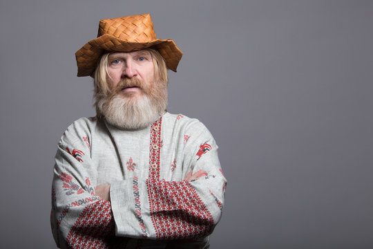 Slavic bearded painted shirt and birchbark hat