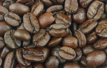 close up of roasted coffee beans as background..