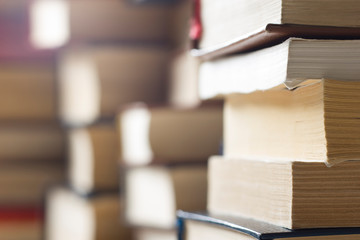 Stack of books background. many books piles.