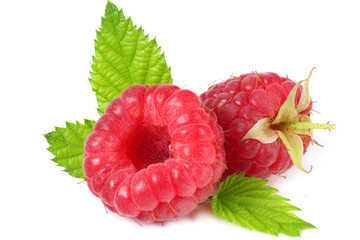 ripe raspberries with green leaf isolated on white background macro