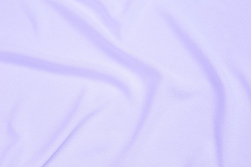 Abstract closeup purple fabric background, blank waving purple  fabric background