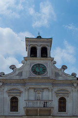 Fototapeta na wymiar Old Italian chapel against the blue sky