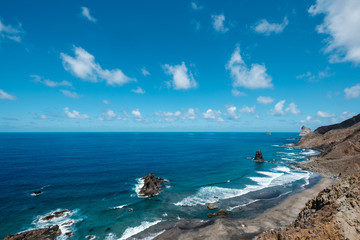 Fototapeta na wymiar Rocks at coast and ocean horizon at Benijo Beach in Tenerife