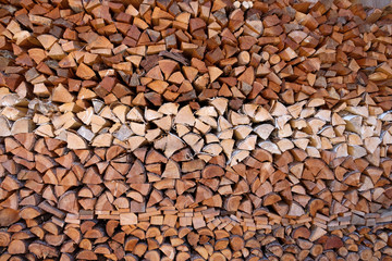 A stack of oven-ready firewood consisting of birch and softwood