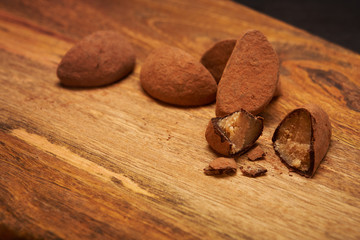 Marzipan candies in cocoa dusting