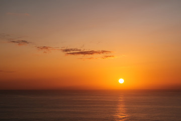 sun over ocean horizon, sunset sky over water -