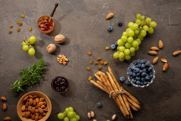 Healthy food background, fruits and nuts