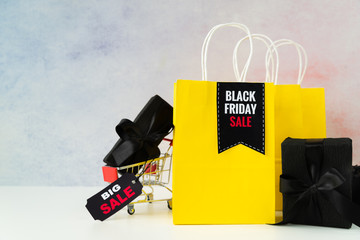Black friday sale shopping bags with gifts
