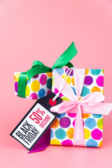 Colorful gifts with black friday discount tag