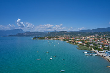 Aerial photography. Beautiful coastline. In the city of Bardolino, Lake Garda is the north of Italy. View by Drone.