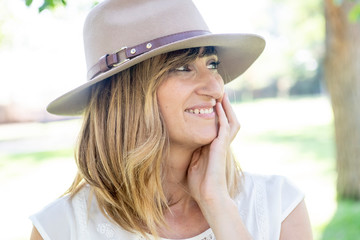 Pretty woman posing in the park