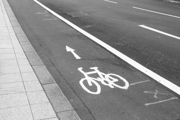 Bicycle lane in UK. Black and white vintage style.